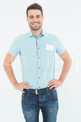 Male technician standing hands on hips