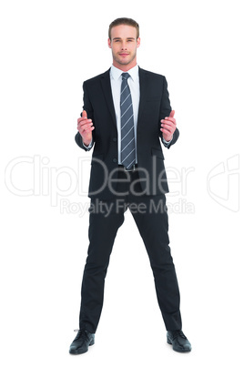 Happy businessman with hands out