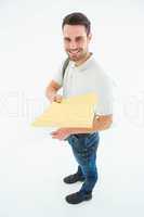 Happy derivery man giving envelop