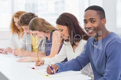 Fashion students being attentive in class