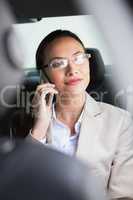 Pretty businesswoman making a phone call