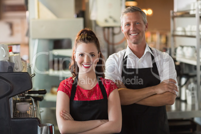 Servers smiling at the camera