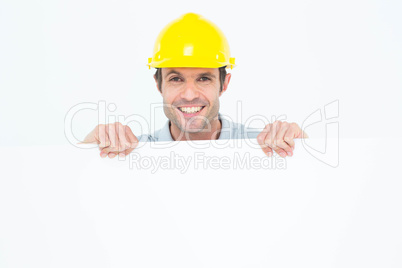 Architect with bill board over white background