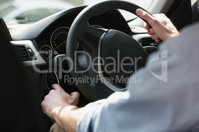 Man holding a steering wheel