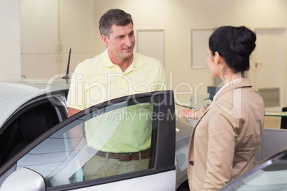 Salesperson talking with her customer