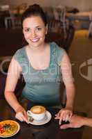 Young couple having coffee together