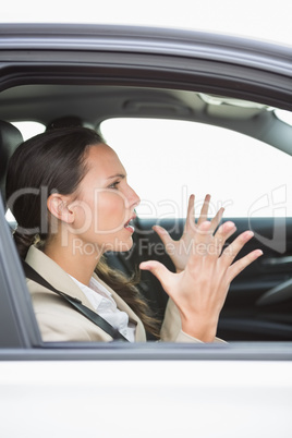 Young woman experiencing road rage