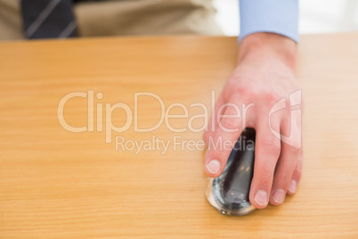 Businessman using mouse of computer