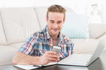 Smiling text messaging and using laptop