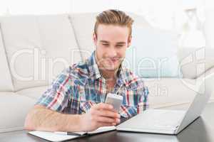 Smiling text messaging and using laptop