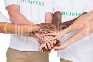 Teamwork with hands together standing