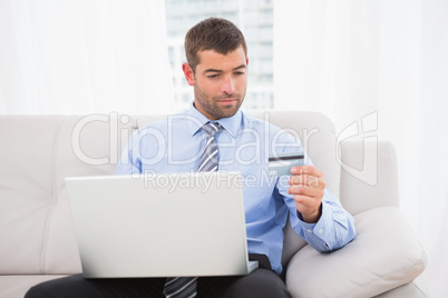 Businessman using his laptop