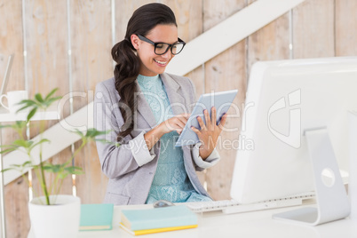 Stylish brunette working from home