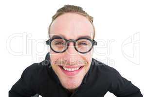 Portrait of smiling geek in shirt