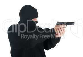 masked man aims with gun