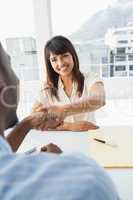 Handshake to seal a deal after a business meeting