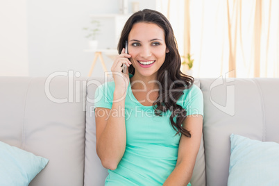 Pretty brunette talking on the phone