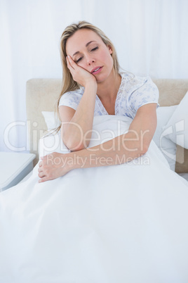 Tired blonde woman on the morning Tired blonde woman on the morning