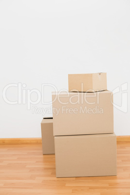 Pile of cardboard boxes on the floor