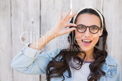 Pretty hipster smiling at camera