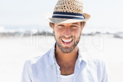 Handsome man smiling at camera on promenade Handsome man smiling at camera on promenade