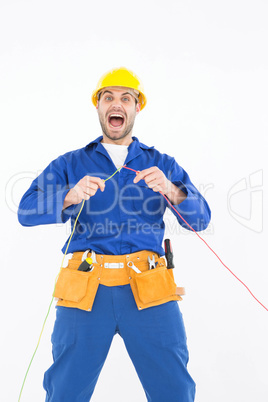 Repairman screaming while holding wires