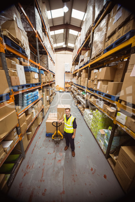 Worker with trolley of boxes