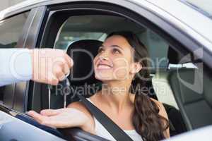 Young woman getting her key