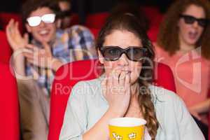 Young friends watching a 3d film