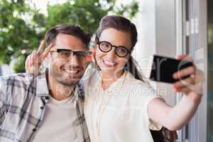 Cute couple on a date taking a selfie