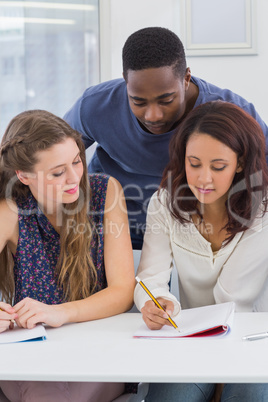 Students working together in class