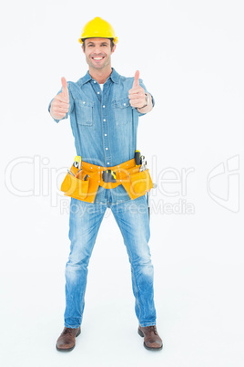 Confident carpenter showing thumbs up