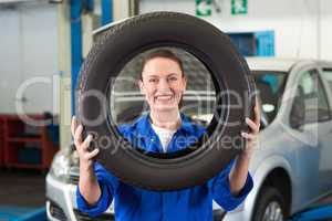 Mechanic looking through tire wheel