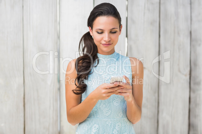 Stylish brunette on the phone