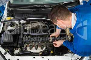 Mechanic working on an engine