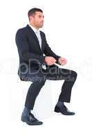 Businessman sitting put his hands front