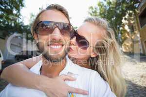 Attractive couple riding a scooter