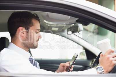 Young businessman having a coffee