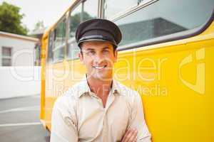 Smiling bus driver looking at camera