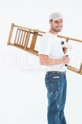 Man with paint roller and step ladder