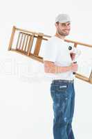 Man with paint roller and step ladder