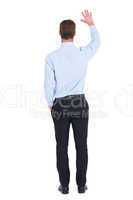 Rear view of businessman in shirt waving