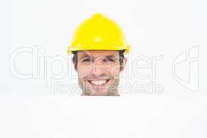Happy architect with bill board over white background