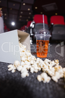 Falling box of pop corn and drink