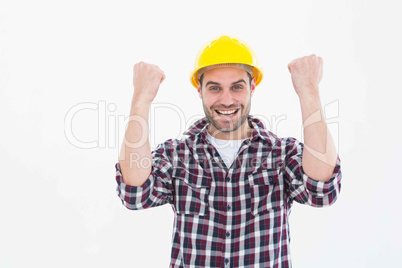 Successful male handyman clenching fists