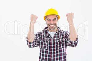Successful male handyman clenching fists