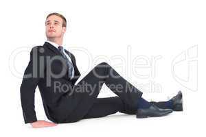 Businessman sitting and looking up