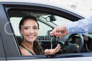 Young woman getting her key