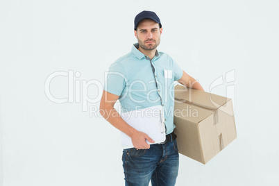 Sad delivery man with clipboard and package