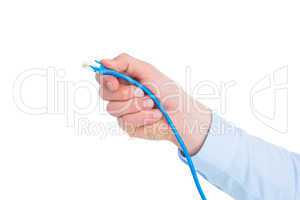Businessman in shirt holding a cable